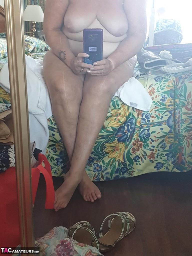 Fat granny with red hair Valgasmic Exposed takes naked selfies at home(13)