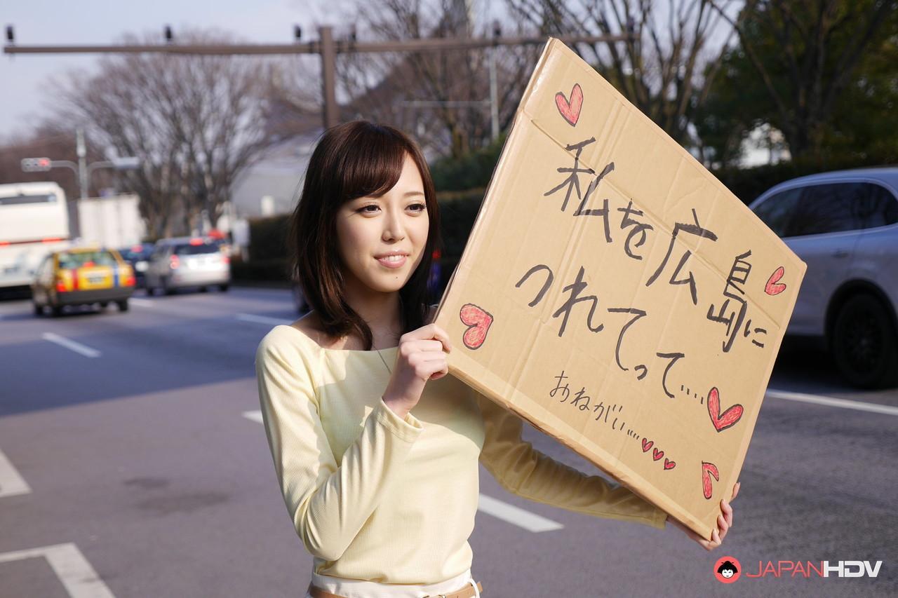 Pretty Japanese girl Shiori Yamate shows her boobs after hitchhiking a ride(3)