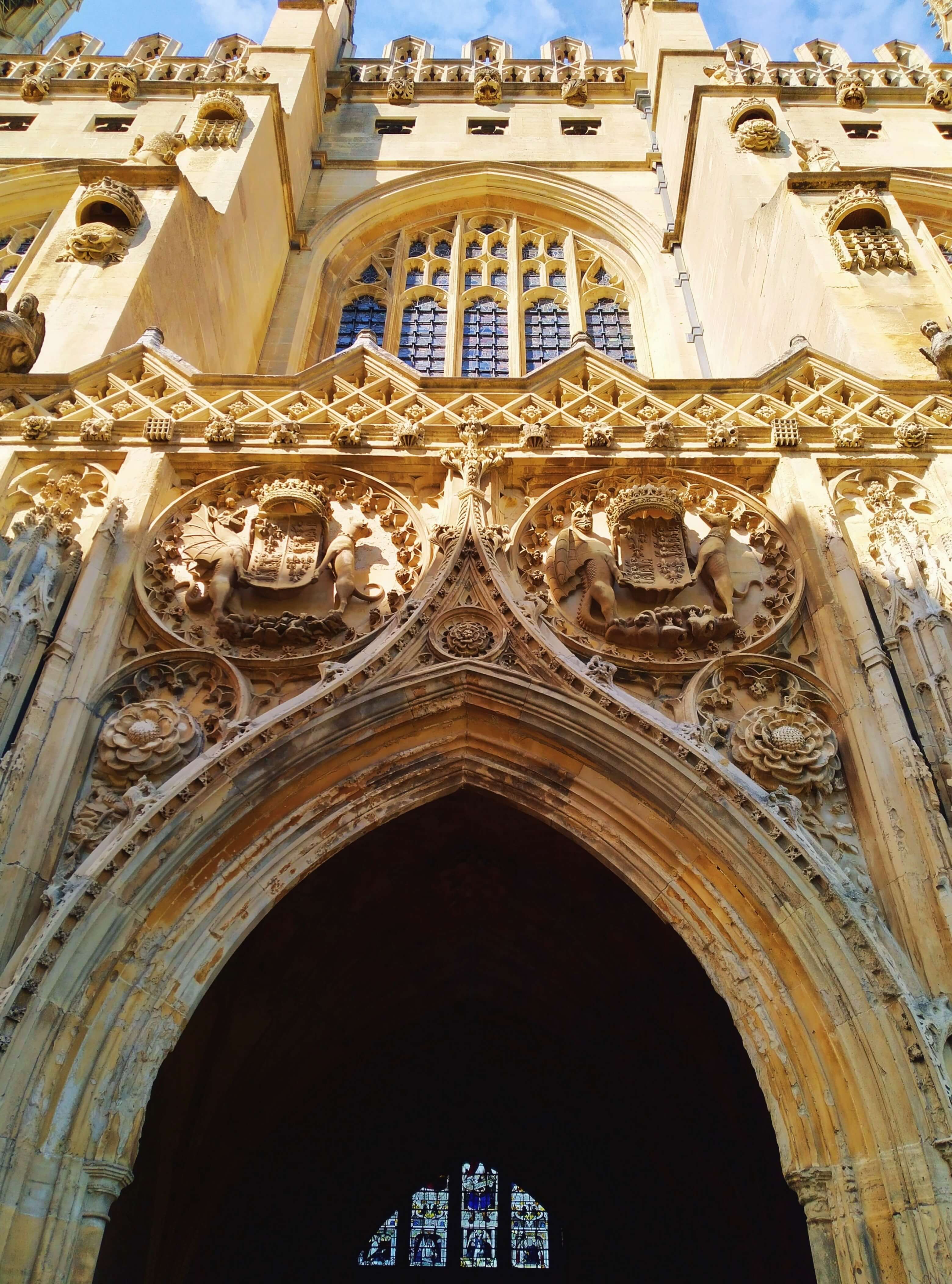 An ornate entrance to a gothic stone building