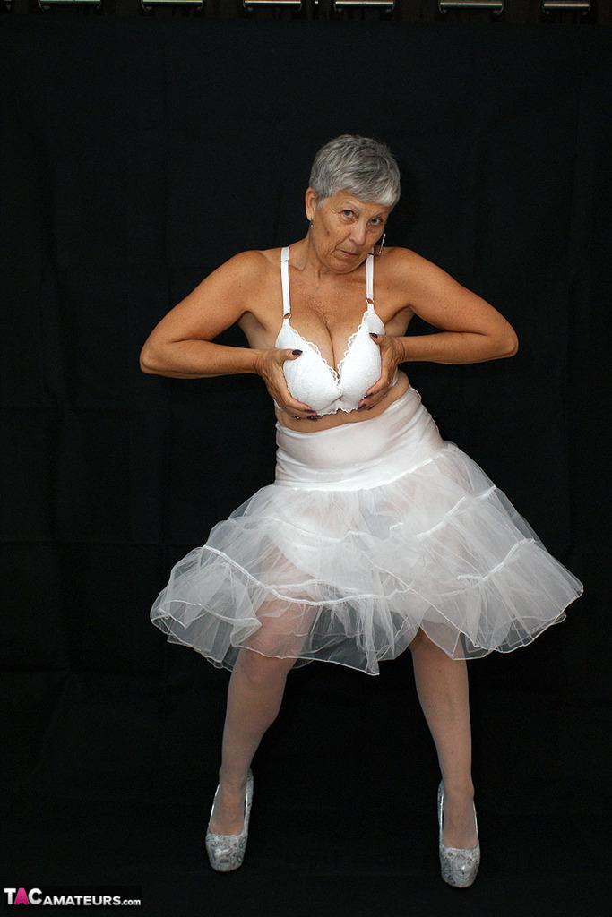 Brazen plump granny Savana flashes panty upskirt in tutu & sparkly high heels(14)