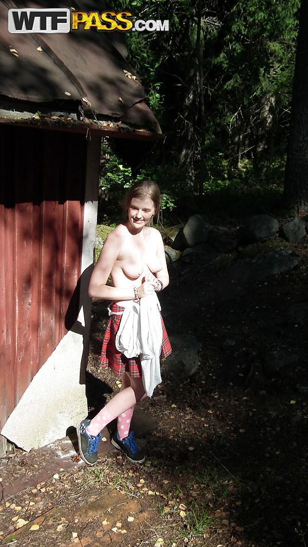 Solo girl shows her tits and twat while forcing entry into abandoned cabin(3)