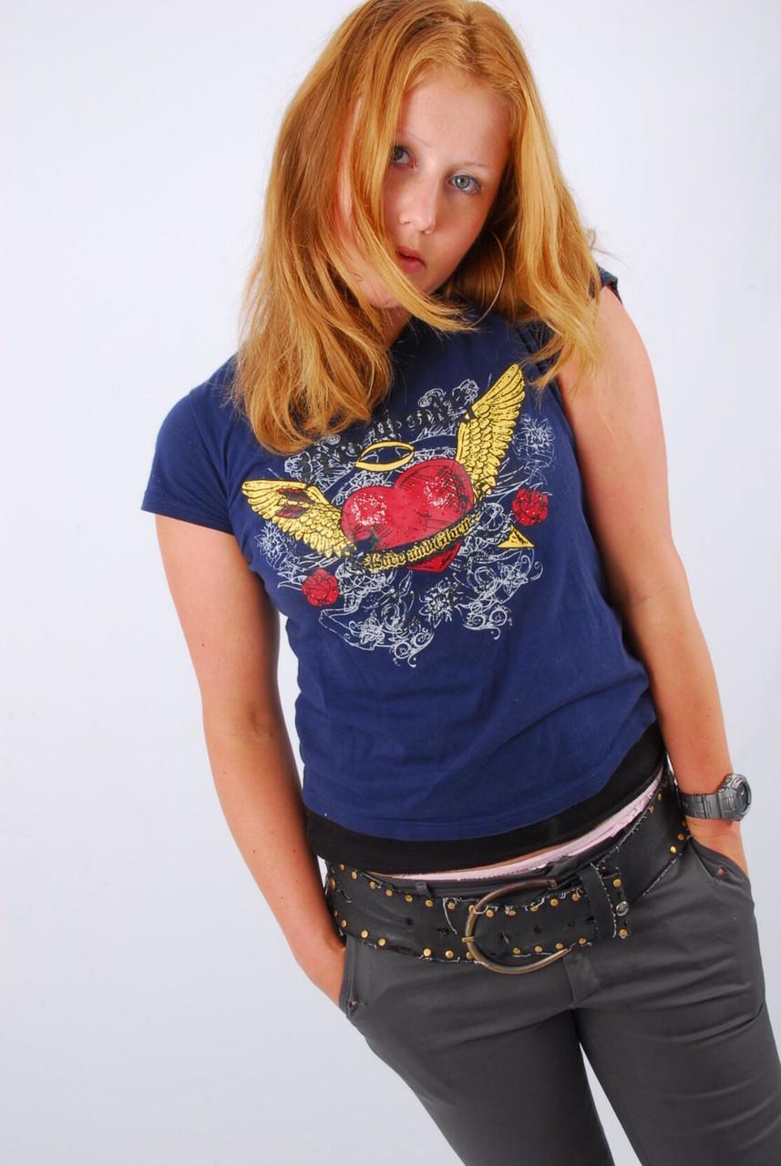 Natural redhead Judy displays her grey G-Shock watch in a T-shirt and jeans(13)