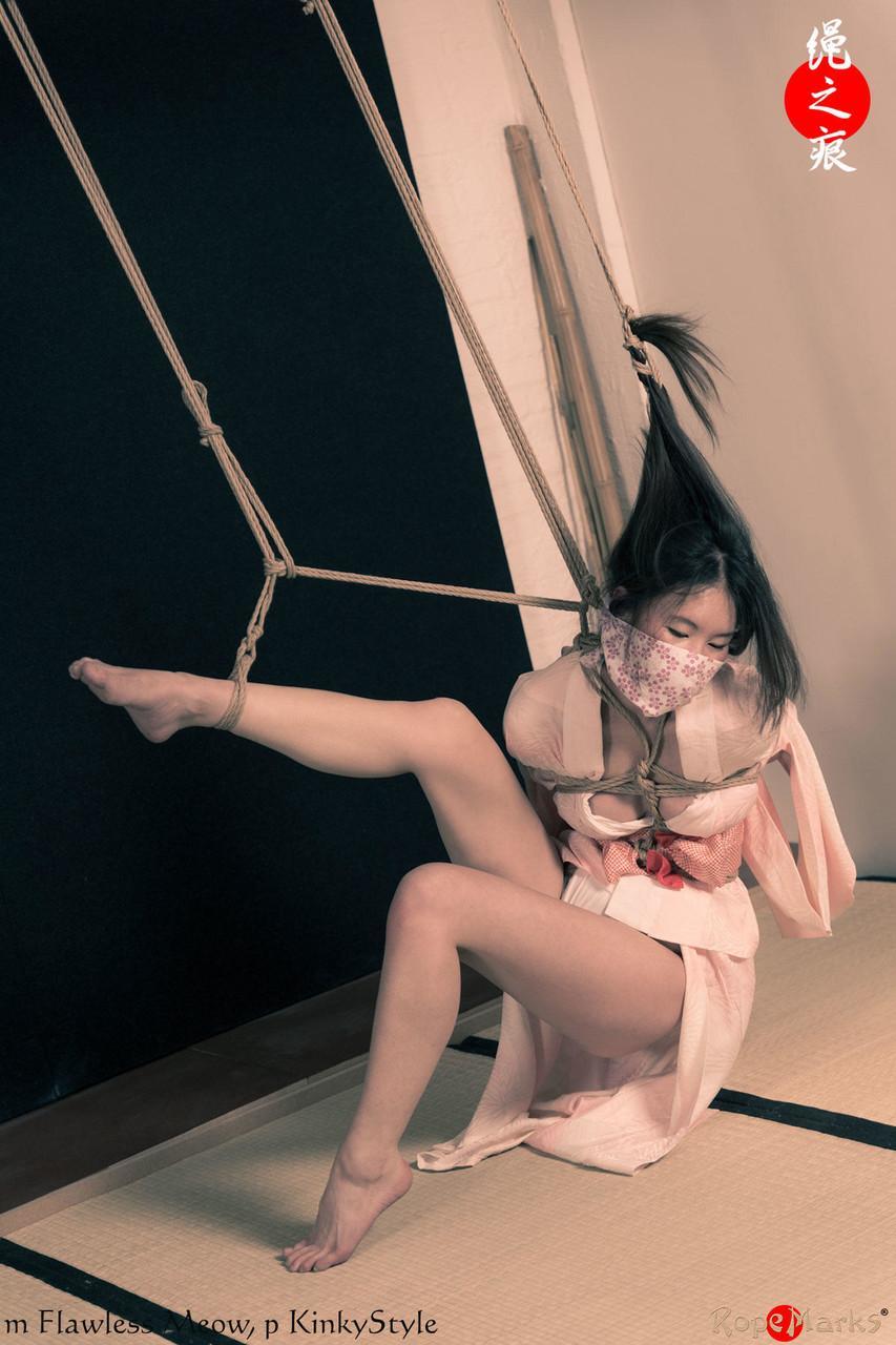 Asian chick Flawless Meow is tied with rope by her limbs and hair(1)