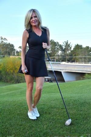 Seductress Hilary flashes her panties & shows her cleavage while playing golf