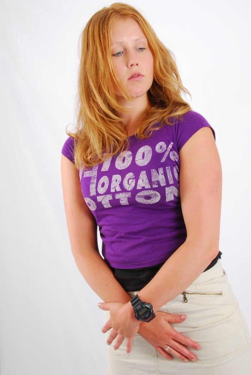 Natural redhead Judy models a black G-Shock watch while fully clothed(14)