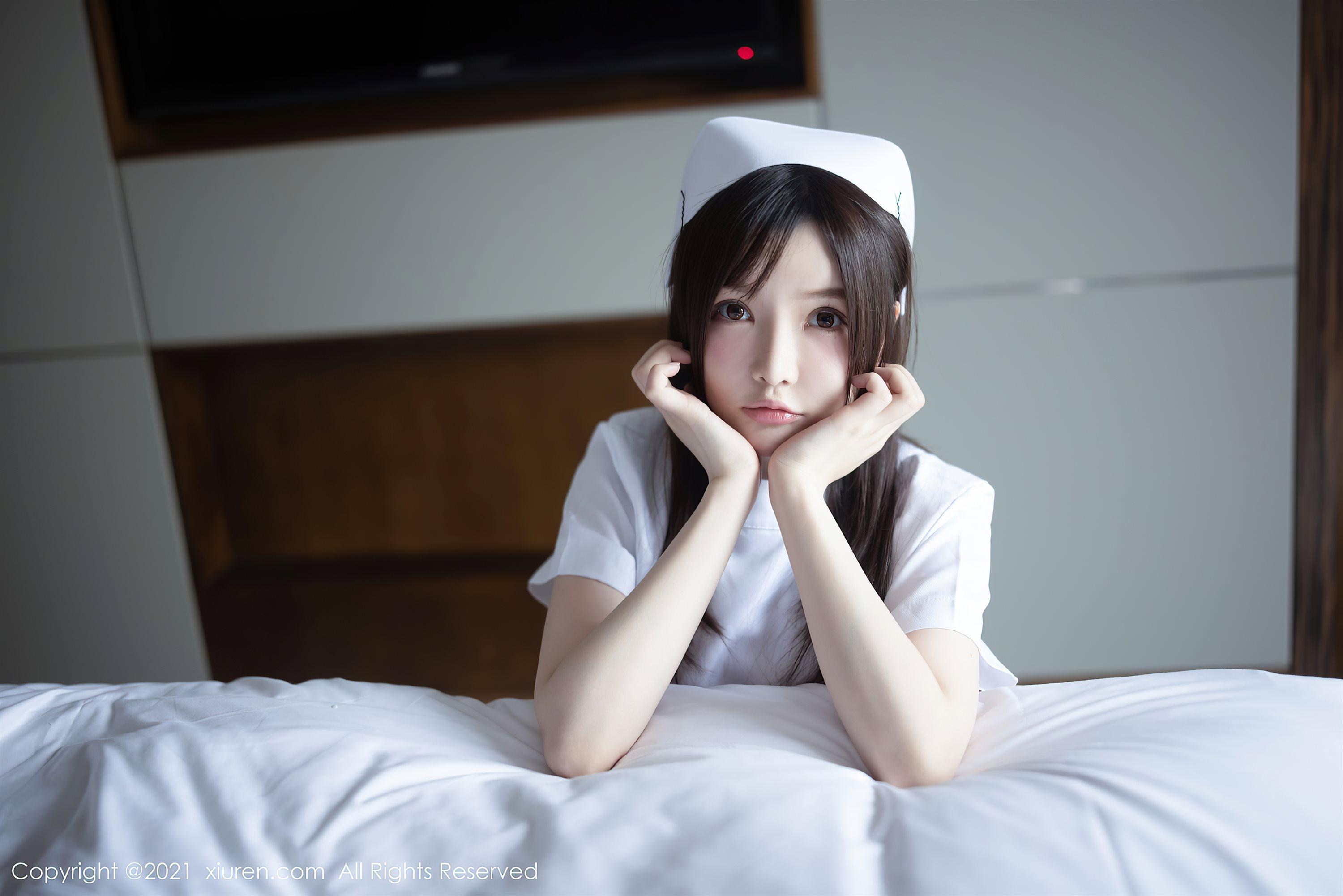 [XiuRen秀人网]No.3114 女神糯美子Mini洁白护士制服主题私房蕾丝内衣秀豪乳翘臀诱惑写真(24)