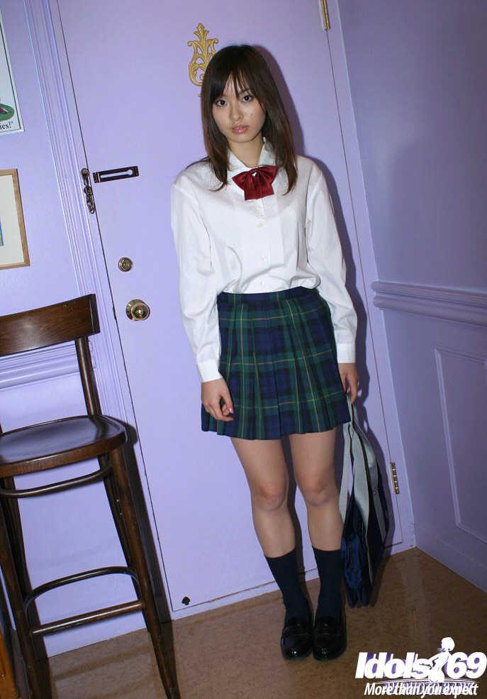 Pretty asian teen babe with tiny tits taking off her school uniform(1)