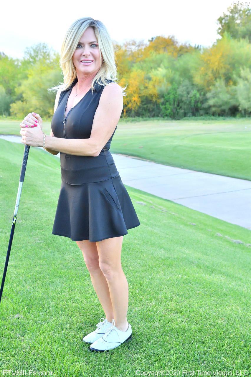 Seductress Hilary flashes her panties & shows her cleavage while playing golf(8)