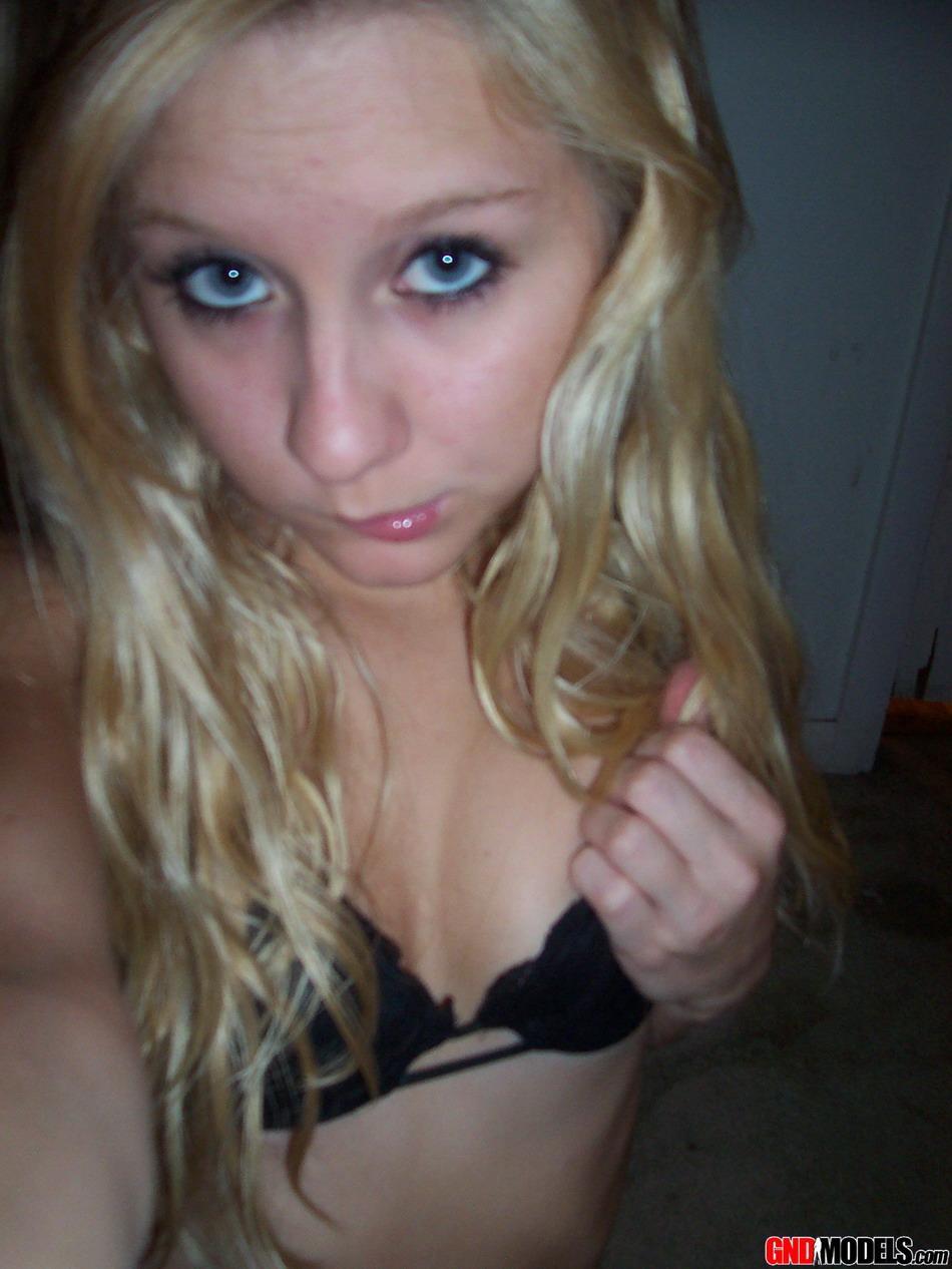 Blonde amateur Kylie takes mirror selfies while disrobing to her bra and thong(8)