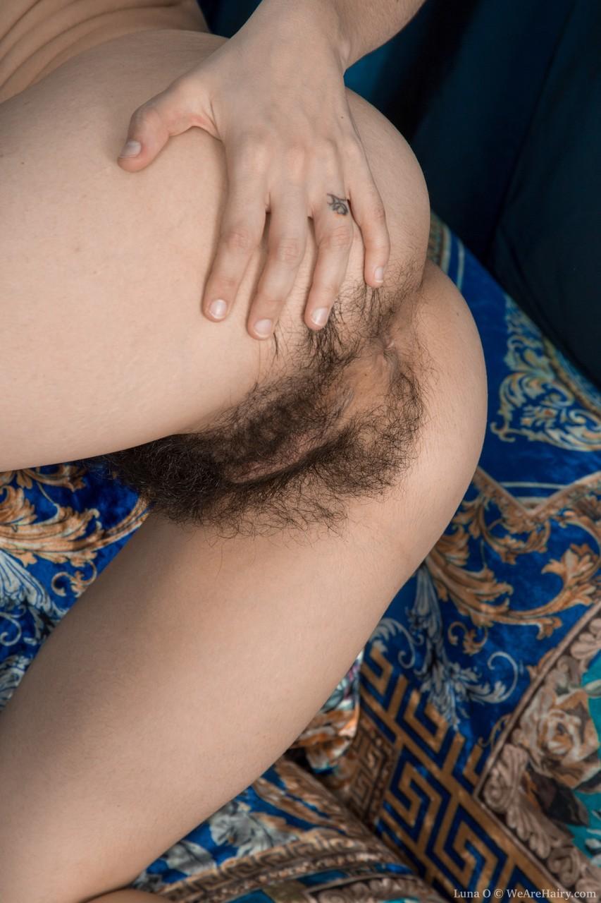 Slender brunette with hairy armpits Luna O bares her hairy vagina(15)