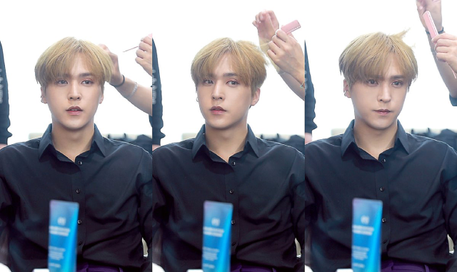 A series of three images of an asian man getting his hair done. His hair is blond, and he is changing expression in every picture- from having his lips parted, to turning his head to the side, to tilting his chin down. He is wearing a black shirt and is against an illuminated white background. He seems like a pretty decent guy.