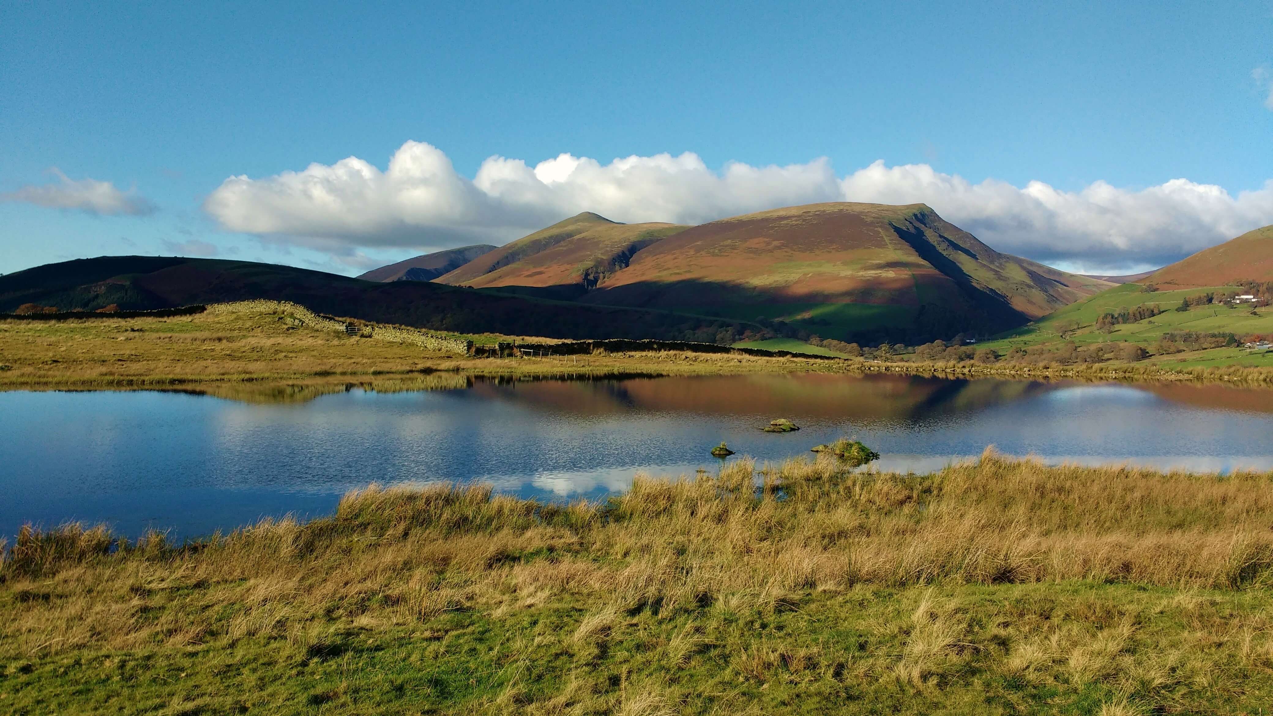 A tarn on a hill on a sunny day