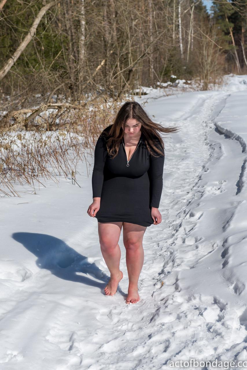 BBW solo girl is ball gagged and bound on snow-covered ground in the nude(12)