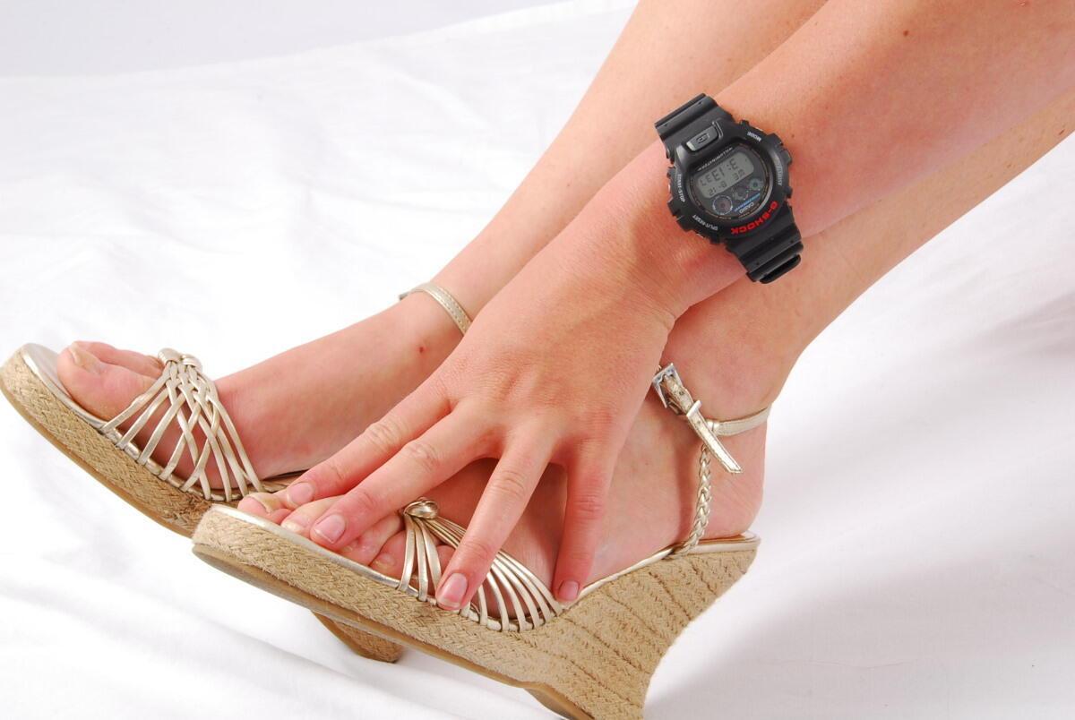 Natural redhead Judy models a black G-Shock watch while fully clothed(2)