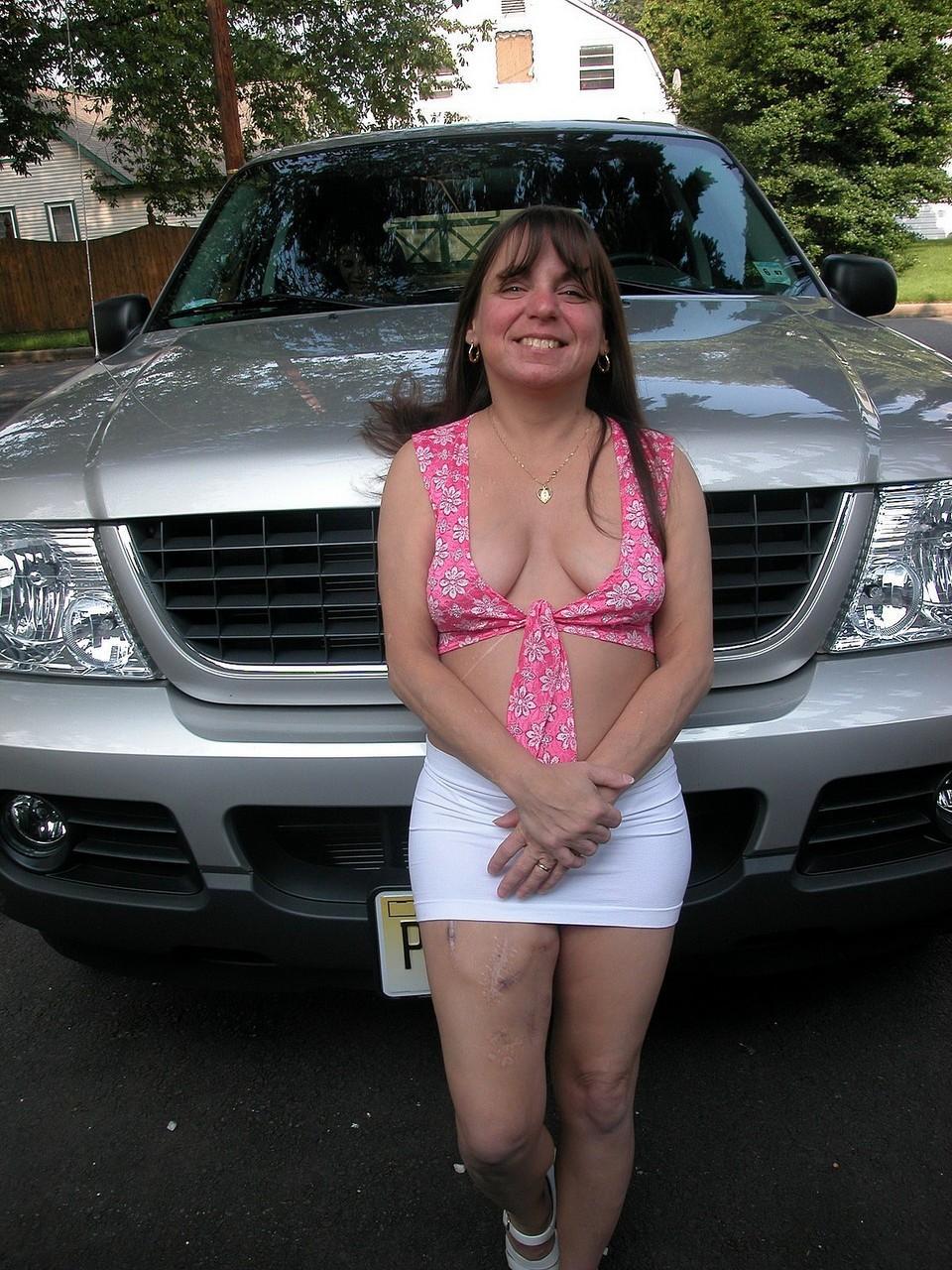 Petite MILF Vixen shows her shaved pussy and toys it in a truck(1)