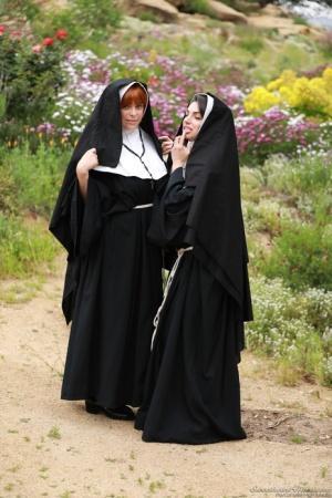 Sinful nuns with juicy boobs Penny Pax & Darcie Dolce lick each other's cunts