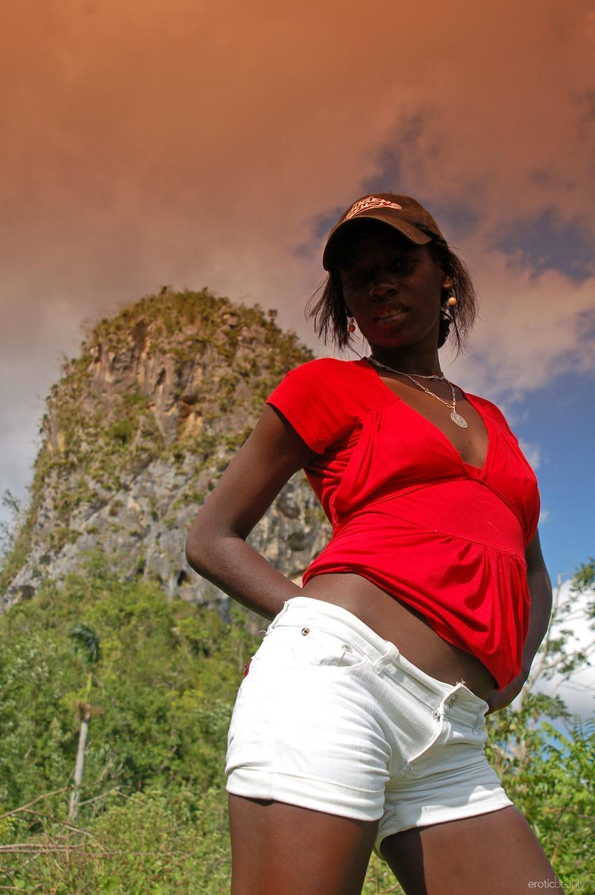 Ebony Maria L removes her shorts & red shirt & teases with her ass outdoors(1)