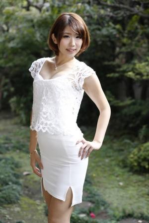 Wonderful Japanese lady Seira Matsuoka posing in her white uniform outdoors