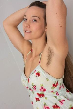 Lovely amateur doll Rion Rhodes strips naked & exposes her hairy body