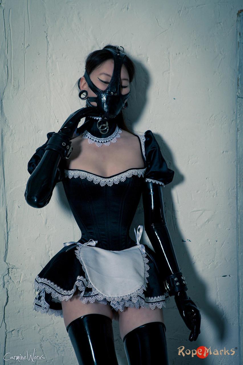 Korean model poses for a solo shoot in a naughty rubber maid outfit(14)