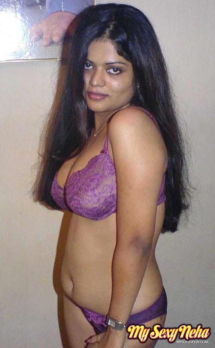 Petite Indian girl uncups big naturals after removing blue jeans(10)