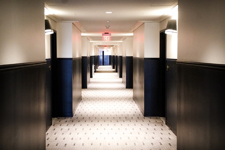 Brightly lit hotel hallway