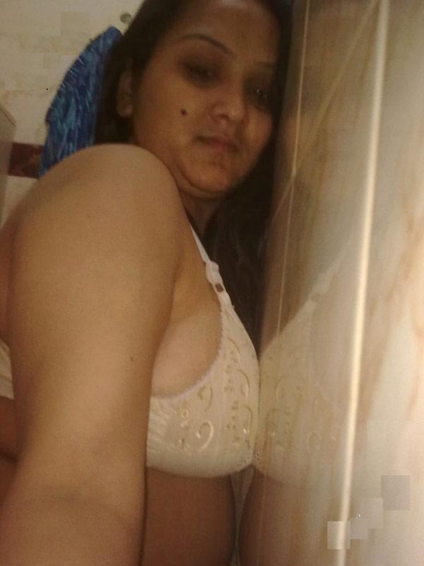 Overweight Indian student shows her bare mid-section in a brassiere(4)