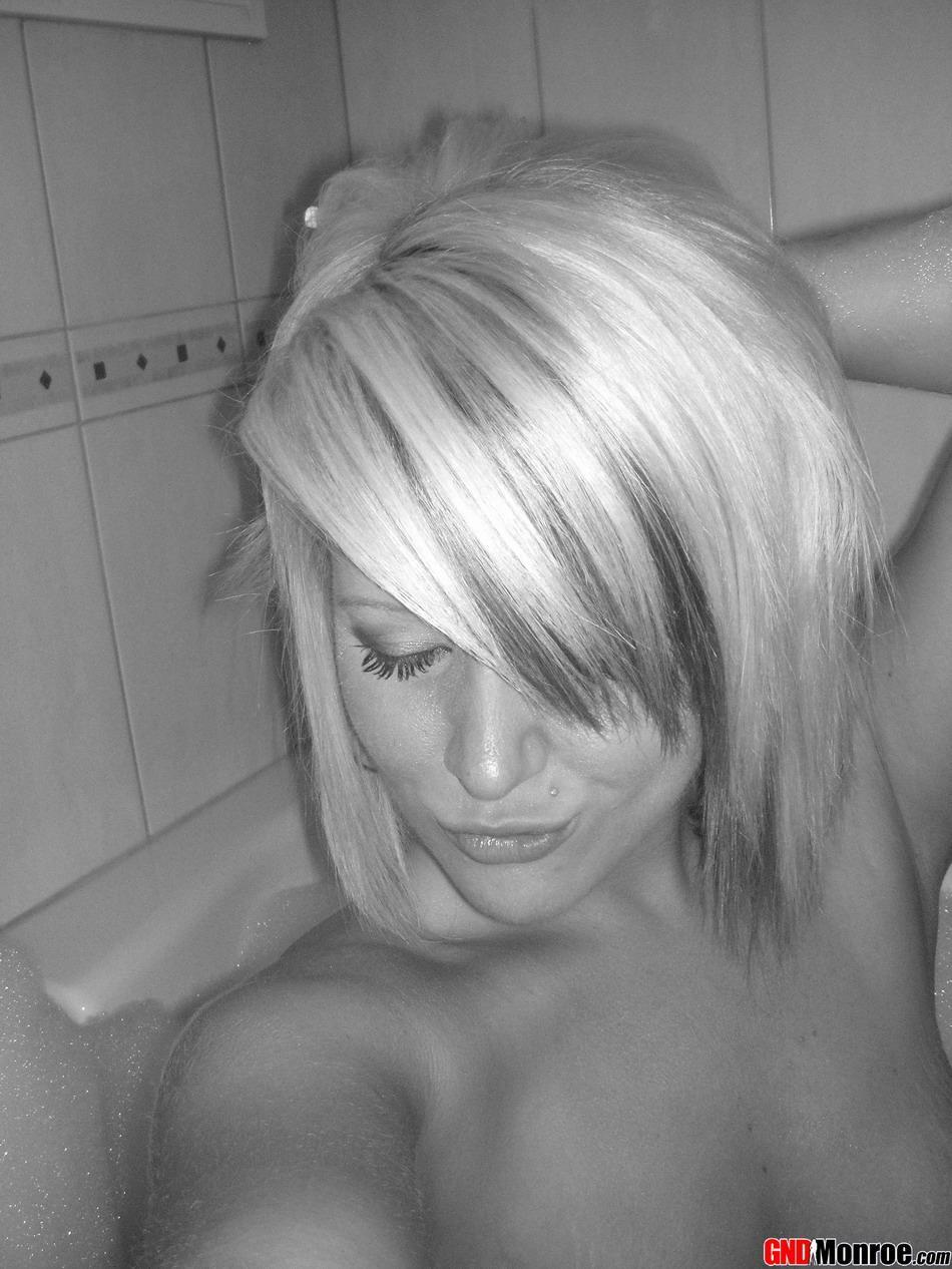 Blonde girl touts her sexy ass during self shot bathroom action(5)