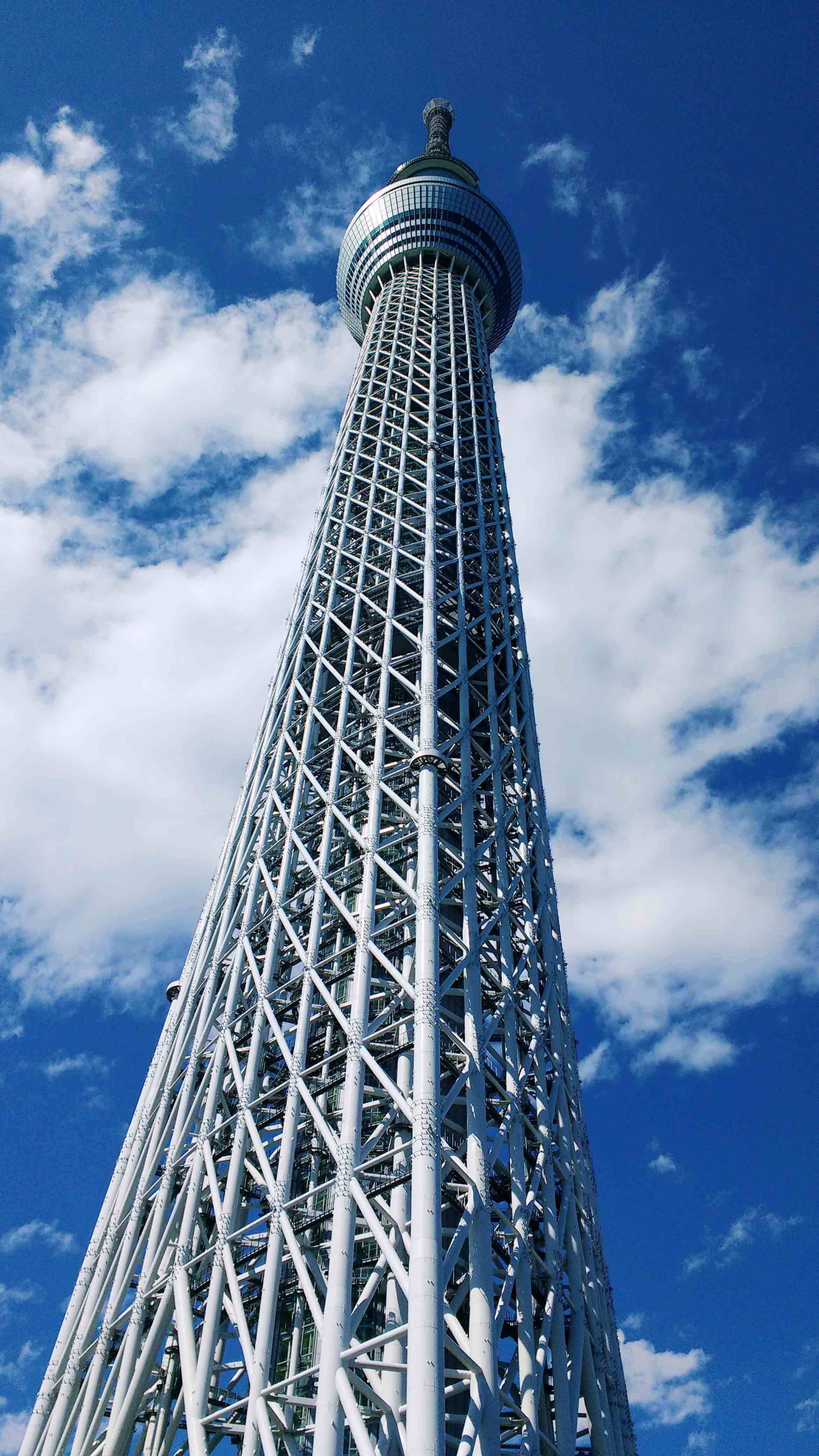 A tall metal structure with a pointed top