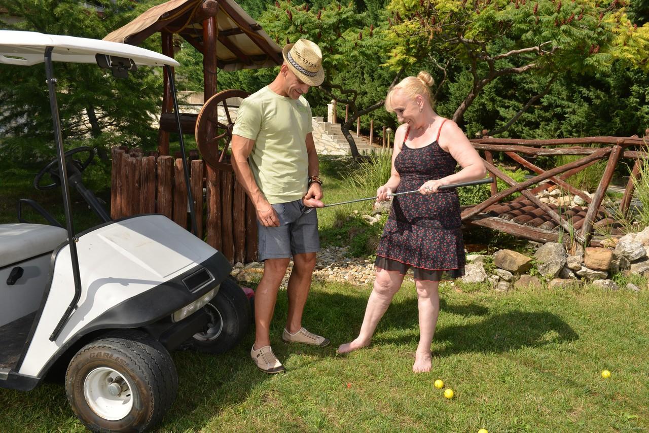 Sexy granny Nanney getting fucked by her horny stud on a golf cart(10)