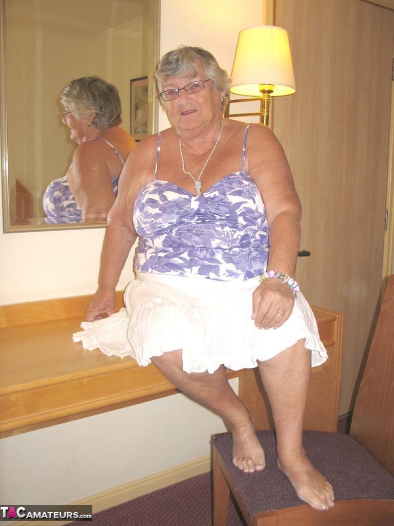 Fat British nan Grandma Libby completely disrobes while in a hotel room(1)