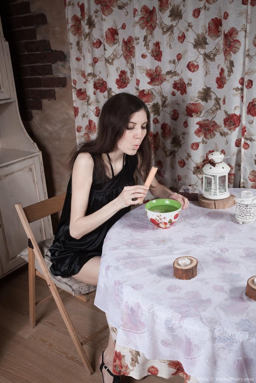 Skinny girl Maia foregoes breakfast to flaunt her hairy bush on the table(1)