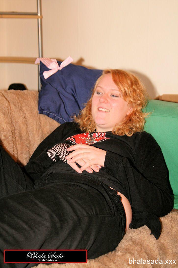 Redheaded fatty strips her sweatshirt and shows her cleavage in a black bra(9)