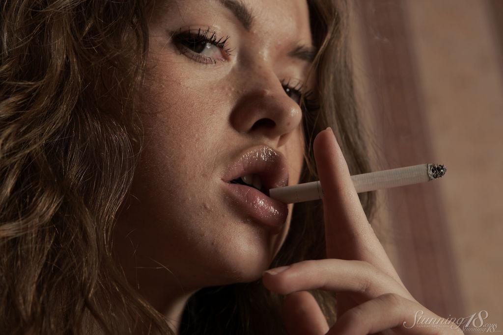 Barely legal girl Vega plays with her pussy while smoking a cigarette(16)