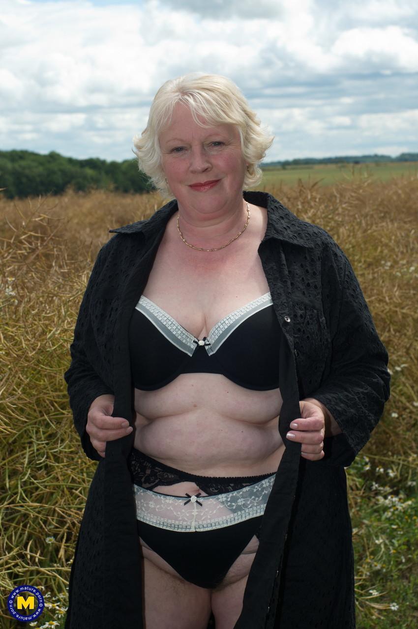 Naughty granny Evelyn S. shows off her chubby naked body outdoors(2)